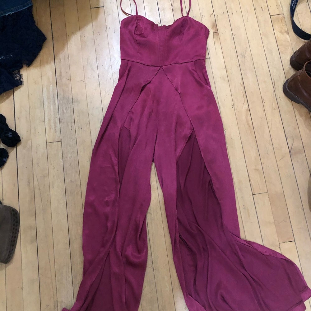 Pink jumpsuit with slits